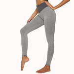 Mulher que faz malha sem emenda cintura alta Nádegas Lifted Yoga Leggings Calças Esporte