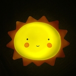 Sun bonito Sorriso rosto suave vinil LED Noite Toy Luz para o bebê Crianças Quarto Decoração Nursery Lamp