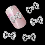 Ficha técnica e caractérísticas do produto 10Pcs 3D Glitter Rhinestone Oco Bowknot DIY Decoração Nail Art Tips Jewelry